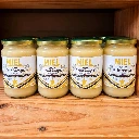 Quatre pots de miel de printemps la mare aux abeilles dans boutique.webp